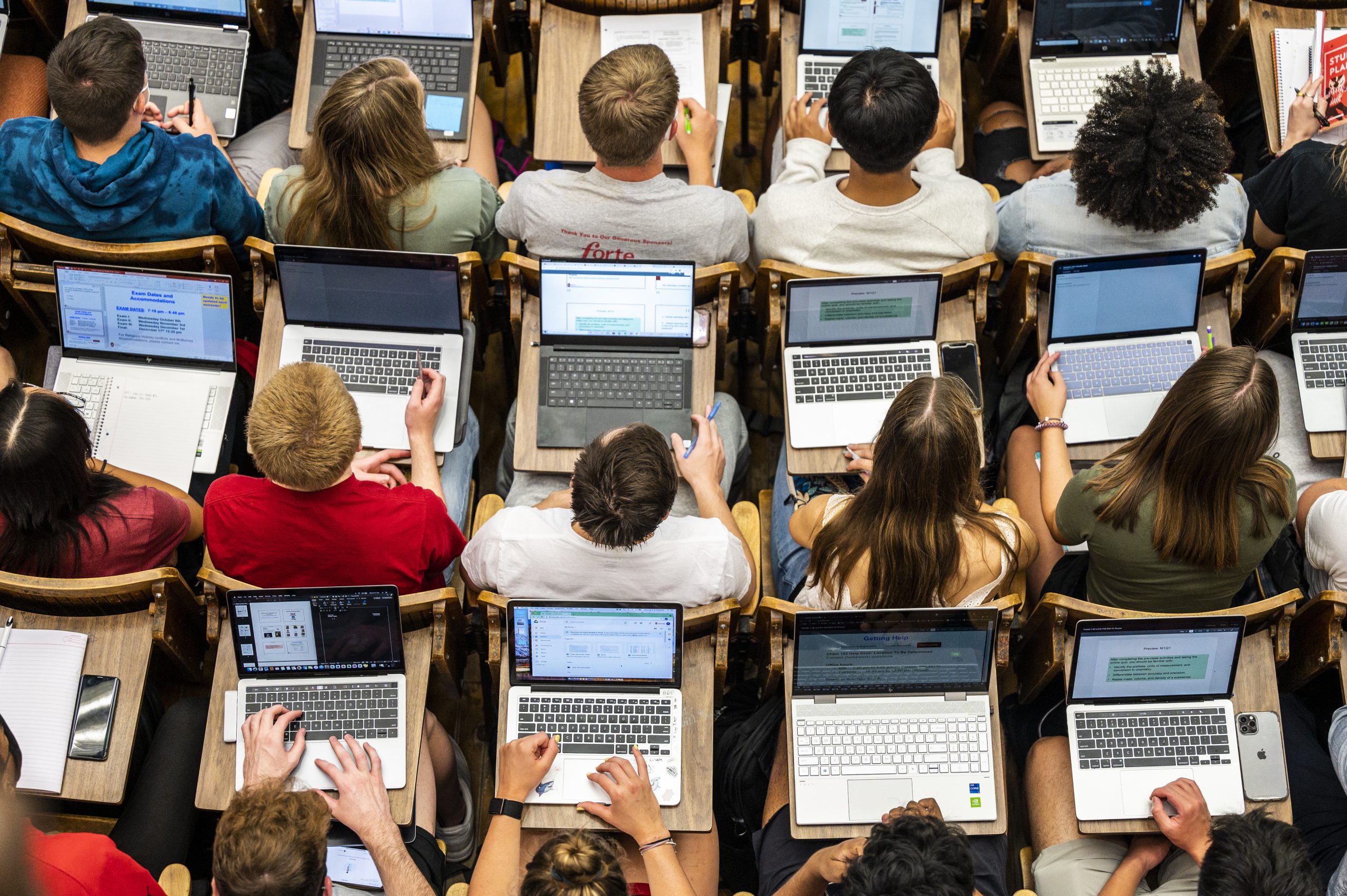 Students follow along with the lecture on their laptop computers in Chemistry 103 in Agricultural Hall.