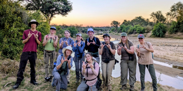 A group of study abroad students post for a photo in South Africa